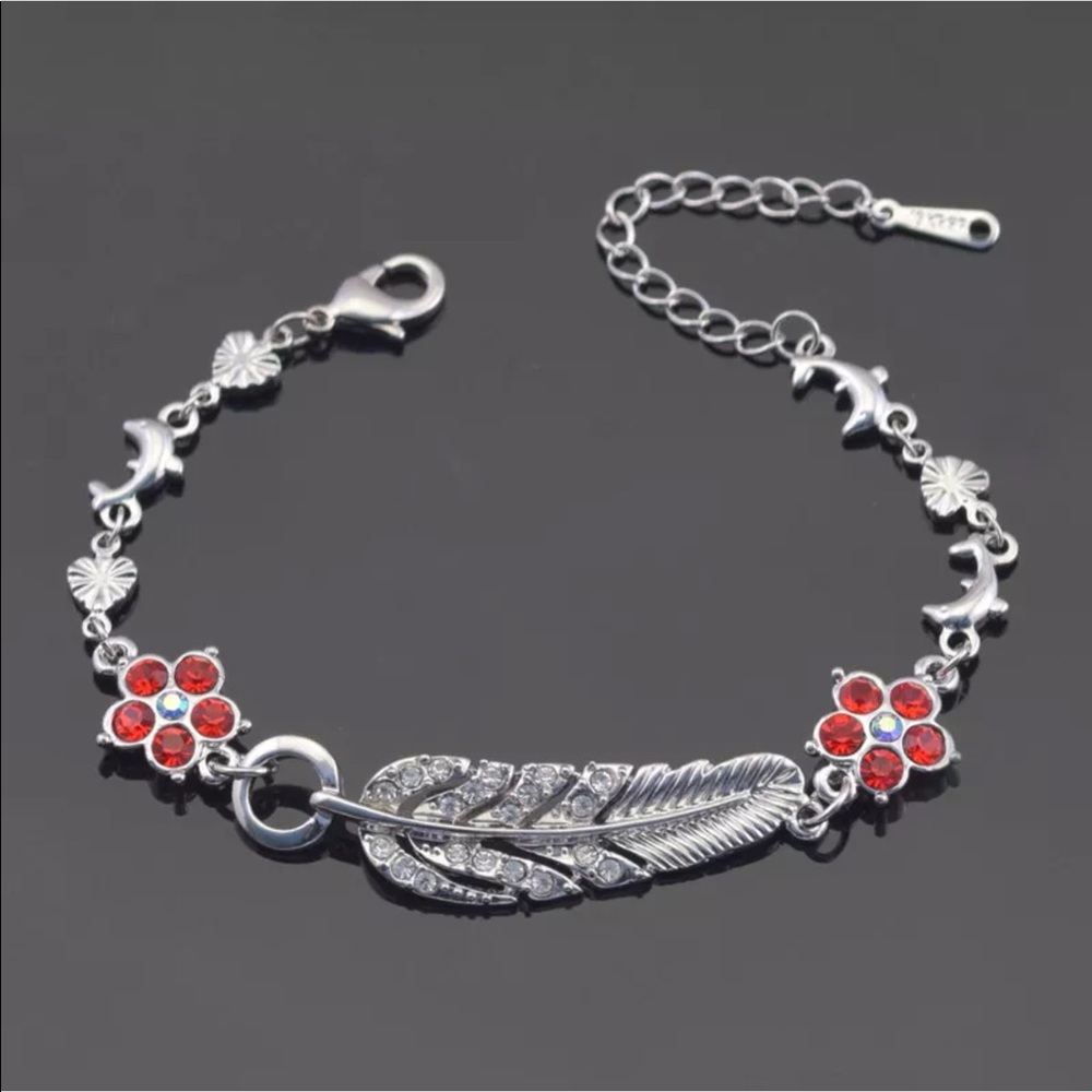 Feather  flower and dolphin bracelet